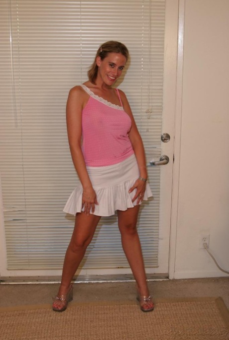 Blonde MILF gets on top during sexual intercourse with her man friend