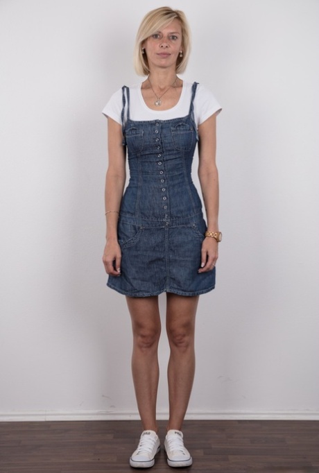 Freckle faced Zaneta takes off her short dress to reveal her slender naked bod