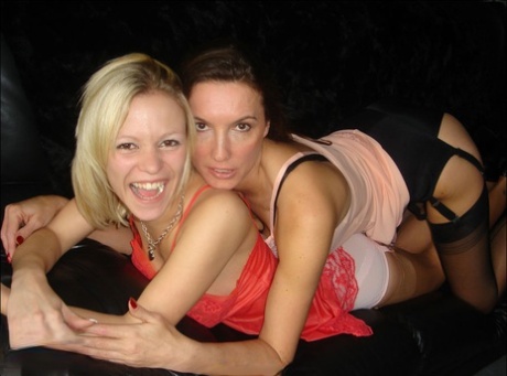 Mature woman Nylon Jane face sits a young blonde and makes her lick her pussy