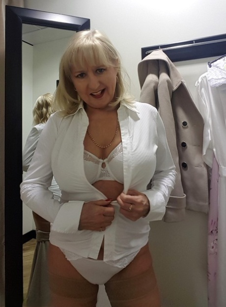 Chubby mature wife Lorna Blu changes form white to red to black sexy lingerie