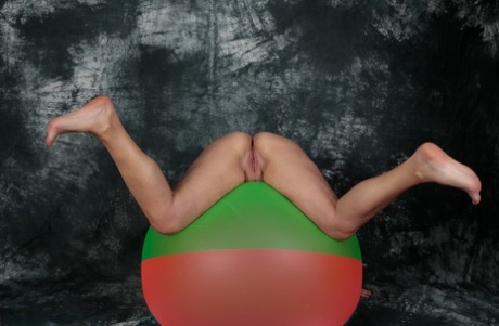 Blonde amateur Sweet Susi gets totally naked on top of a bouncy ball