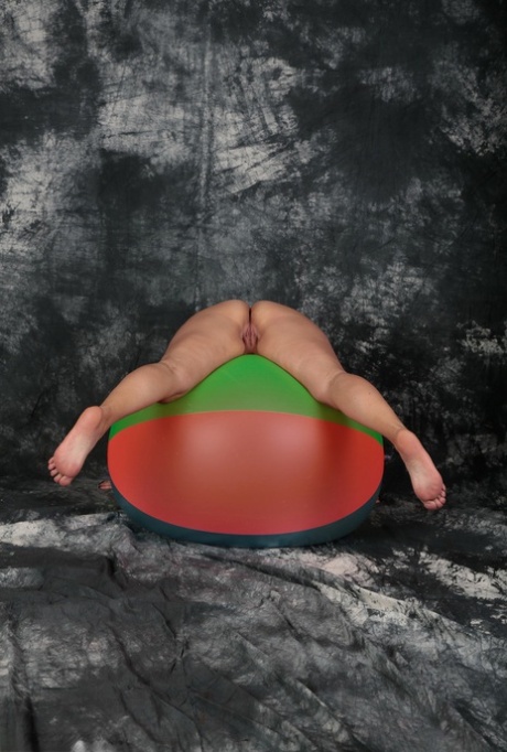 Blonde amateur Sweet Susi gets totally naked on top of a bouncy ball