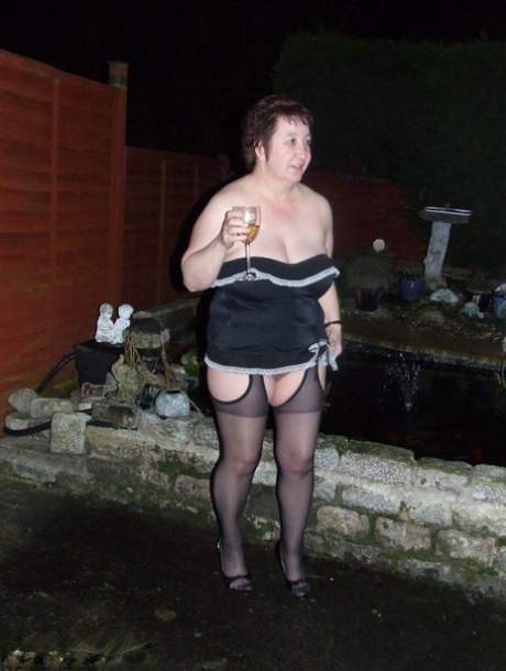 Mature redhead Kinky Carol masturbates with a vibrator before being banged