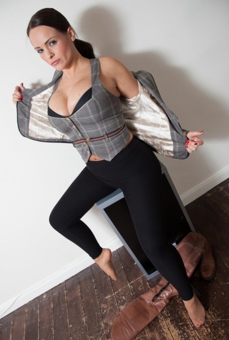 UK model Holly Mcguire sets her big tits free wearing black leggings