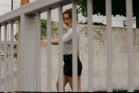 Older woman Dirty Angie takes a piss outdoors in retro nylons
