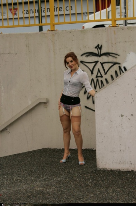 Older woman Dirty Angie takes a piss outdoors in retro nylons