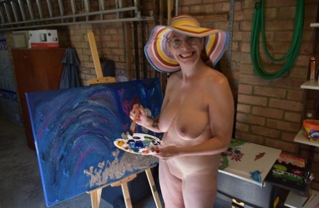 Older blonde Barby Slut gets naked in heels at a country house