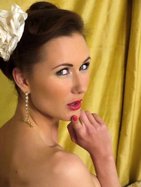 British pinup model strips to her granny panties and nylons