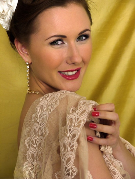 British pinup model strips to her granny panties and nylons