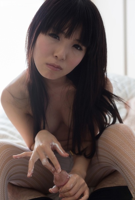 Tiny teen Japanese girl in tights giving a messy POV handjob & licking cum