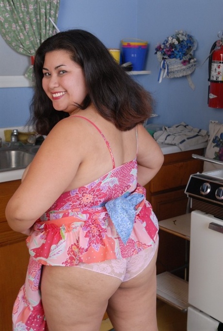 Fat chick Tyung shows off fat rolls while stripping naked in kitchen