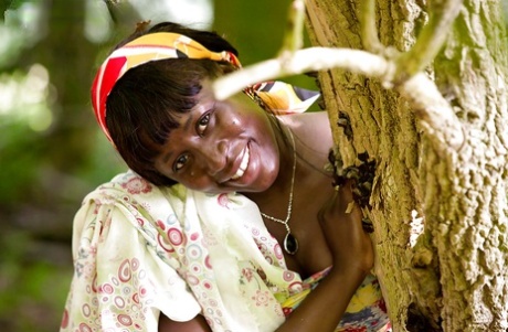Older black woman Lewa getting naked in woods for nude modeling debut