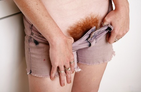 Redheaded wife Ana Molly baring nice ass and hairy vagina