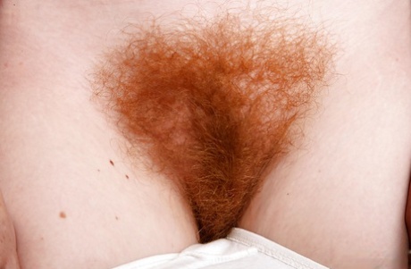 Redheaded wife Ana Molly baring nice ass and hairy vagina