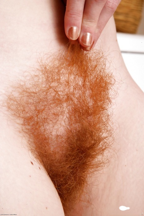 Redheaded wife Ana Molly baring nice ass and hairy vagina