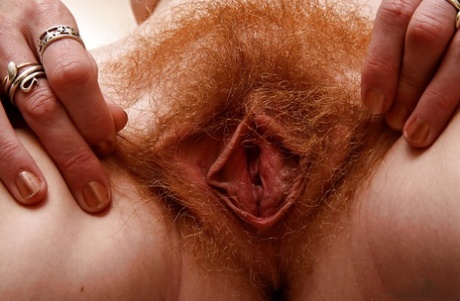 Redheaded wife Ana Molly baring nice ass and hairy vagina