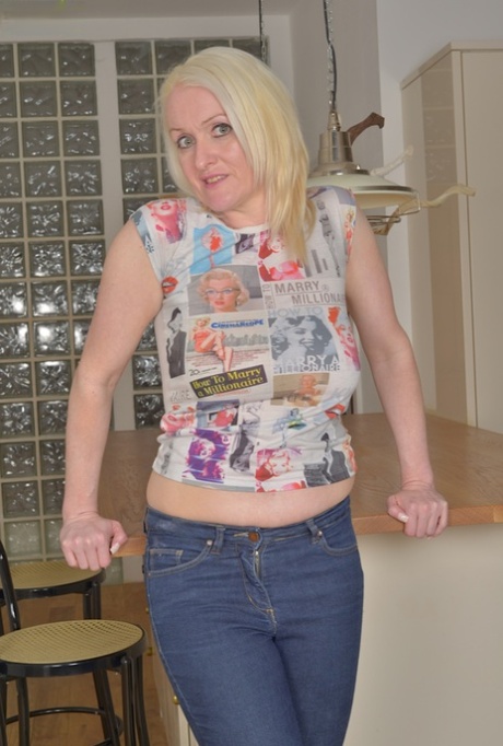 Blonde over 50 MILF Jade Wilson revealing nice all natural granny tits
