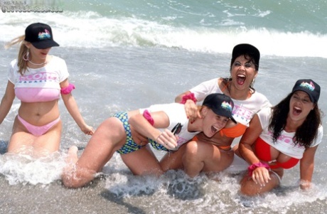 42yo Autumn Jade and several hotties show their bosoms on the beach