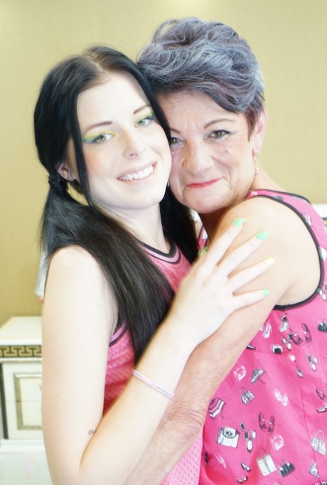 Wrinkled lesbian granny Jaclyn fooling around with her sexy girl toy Julia O