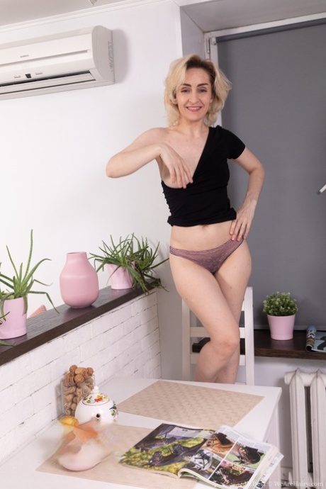 Horny granny with an incredible body and tits Di Devi presents her bush