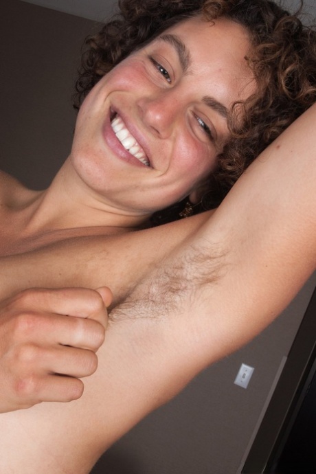 Charming Saige proudly exposing her furry armpits and hairy vagina