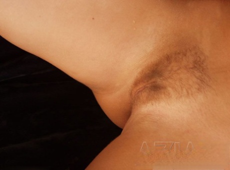 Sexy blonde MILF Tabitha Stern rubs her hairy twat in solo action