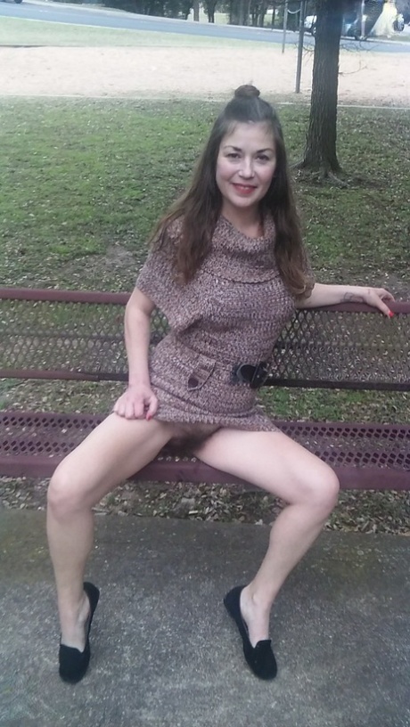Amateur MILF Olivia Johnson flashing her super hairy pussy in public