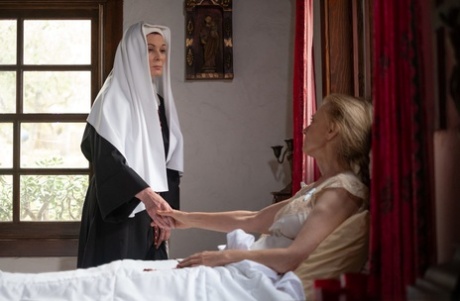 Two sinful nuns Magdalene St. Michaels and Nina Hartley pleasuring each other