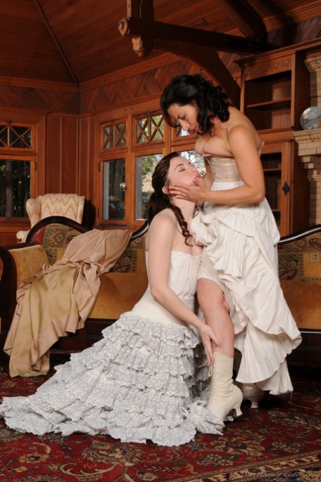 Costumed MILFs Melissa Monet & Annabelle Lee showing natural tits & kissing