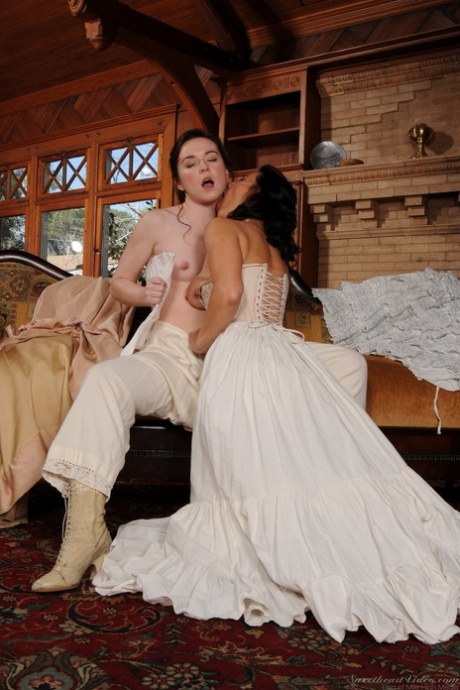 Costumed MILFs Melissa Monet & Annabelle Lee showing natural tits & kissing