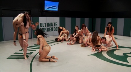 Lesbian sluts fuck each other with strapons in a wild all-girl orgy