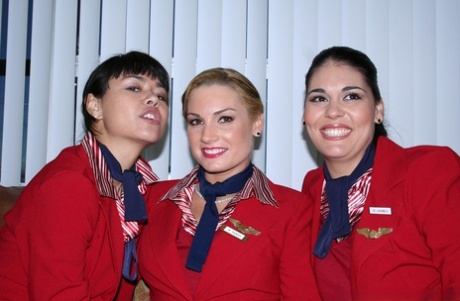 Sexy stewardesses exposes their wonderful bums and big breasts together
