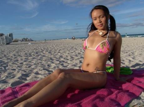 Little Asian MILF Mya Luanna gets picked up at the beach and fucked on a sofa
