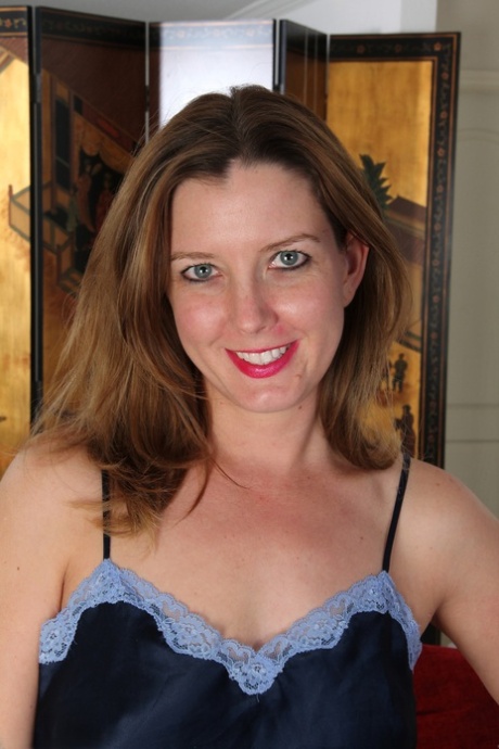Luscious amateur MILF Sally Jones shows her natural tits and pink pussy