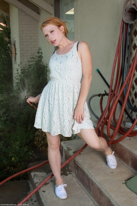 Ginger teen Madison Young doffs her dress and undies to show her curves