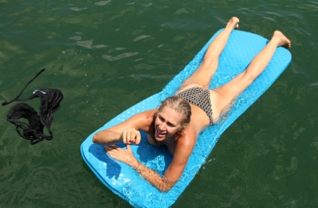 Mature hottie Sabrina P stripping, posing nude & masturbating on a floaty