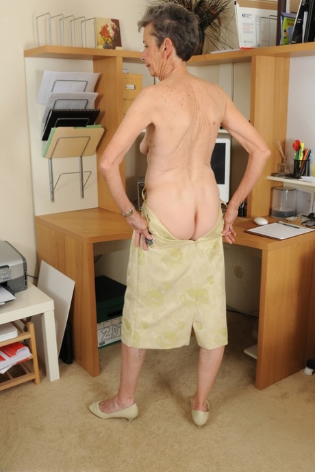 Granny secretary Cassie strips & shows off her fragile body completely nude