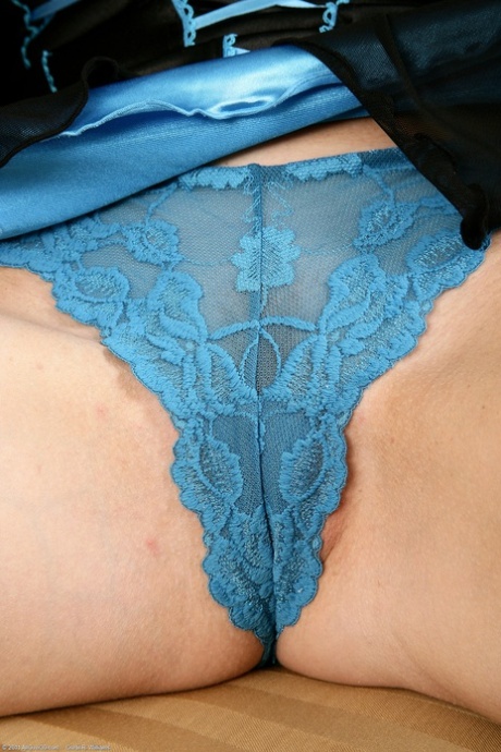 Adorable lady Cheyanne removes her panties and shows her mature holes