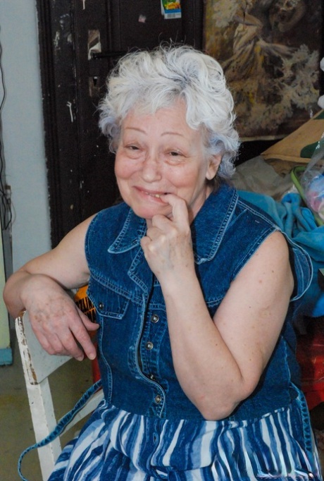 Cock-craving granny Agnes pleasuring her hairy pussy with a dildo