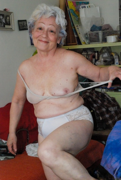 Cock-craving granny Agnes pleasuring her hairy pussy with a dildo