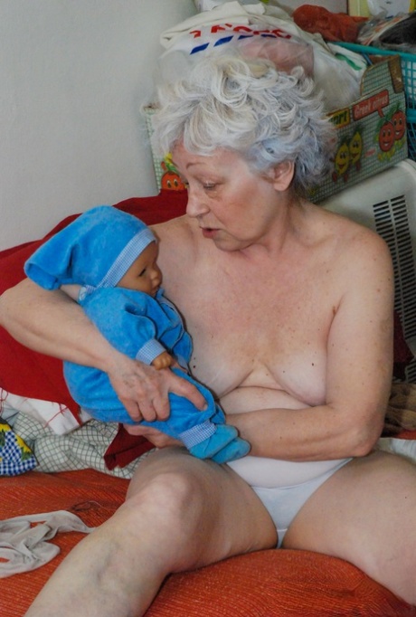 Cock-craving granny Agnes pleasuring her hairy pussy with a dildo