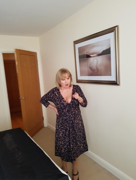 Chubby Lorna Blu displays her big tits & bald cunt in front of her wanking man