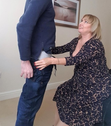 Chubby Lorna Blu displays her big tits & bald cunt in front of her wanking man