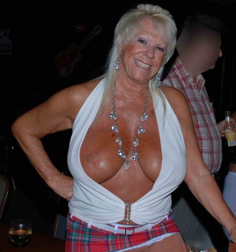 Blonde amateur Tracy Lick flaunts her curves while getting blacked in a club