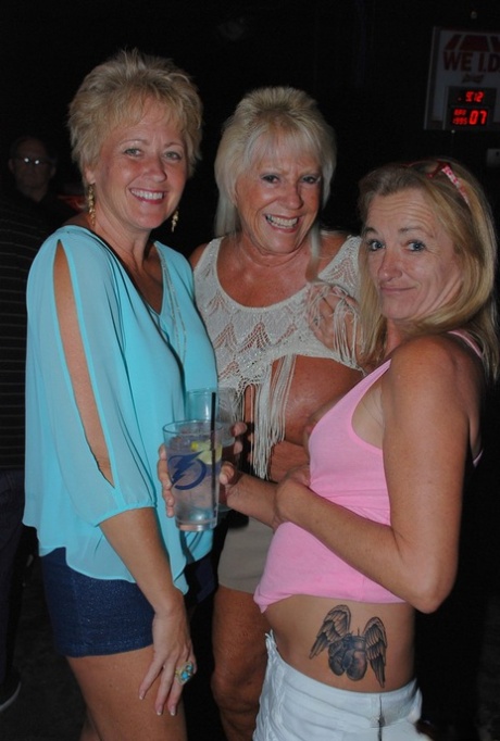 Amateur swinger Tracy Lick and her girls play with horny guys in a night club