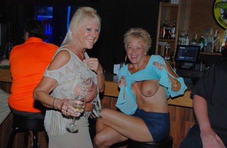 Amateur swinger Tracy Lick and her girls play with horny guys in a night club