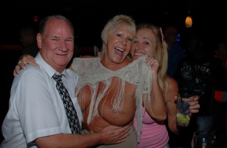 Amateur swinger Tracy Lick and her girls play with horny guys in a night club