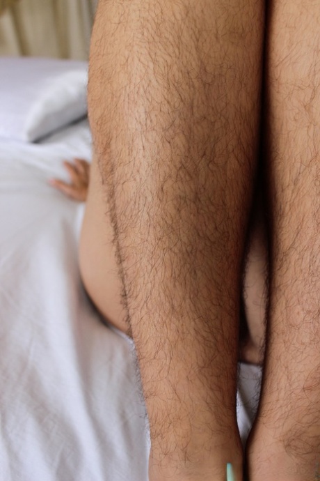 Charming all-natural MILF Nikki Silver reveals her hairy body parts & poses