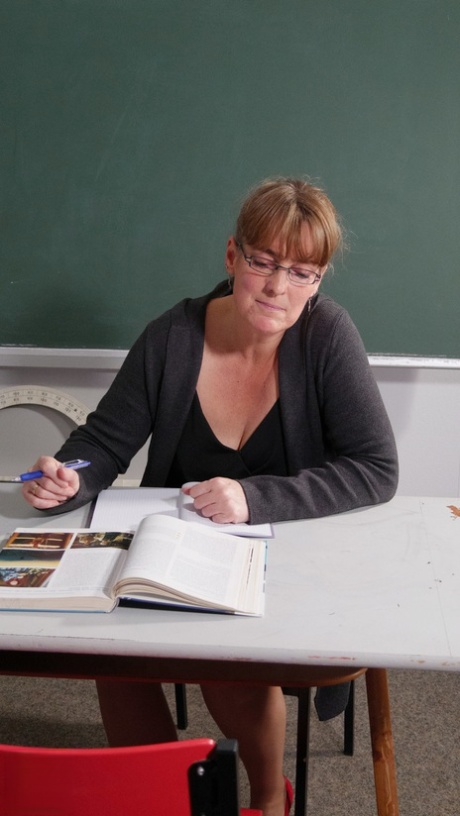 Schoolteacher Marie R exposes her hot body and masturbates in the classroom