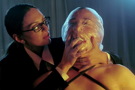 European MILF in glasses Lady Empress smokes and torments a naughty guy